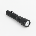 Black flashlight on a white background