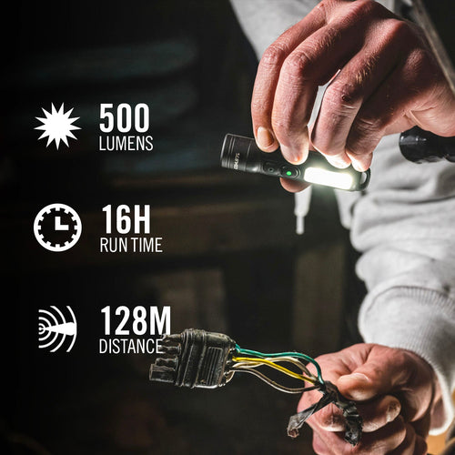 Person holding a flashlight with specifications displayed on a dark background